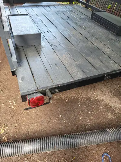 Flatdeck Utility Trailer. 106" by 76" deck size. Width between fenders is 47.5"". Can drive over fen...