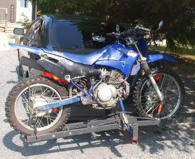 Steel hitch mounted motorcycle carrier, strap down style, holds up to 500lbs