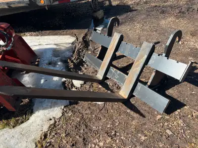 New Quick attach forks for 410J Worksite Pro. Never used. $4500 OBO Located Kenora,Ont.