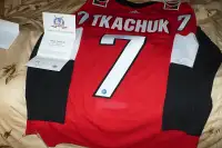brady tkachuk signed jersey