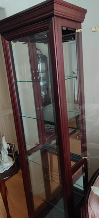 Wooden curio cabinet.