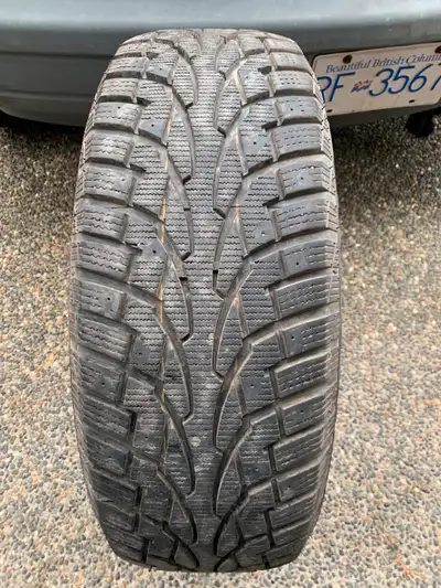 a nice winter tire with lots of tread and in great shape size 245/60/18 105T M+S Uniroyal Tiger Paw...