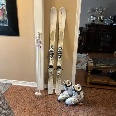 143 Dynostar ski with boots , poles , View more