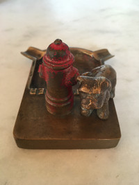 Brass ashtray - dog lifting his leg on red fire hydrant