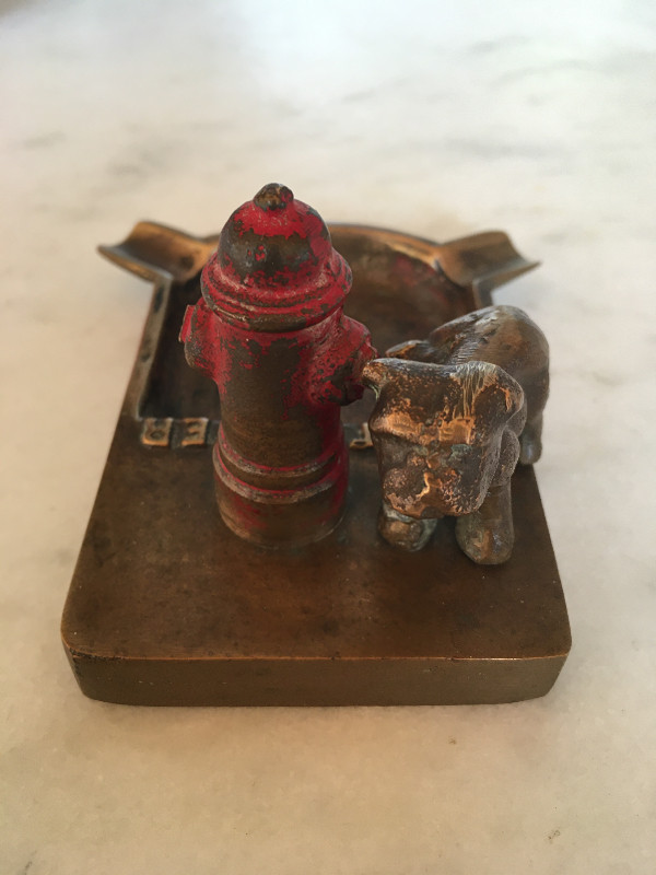 Brass ashtray - dog lifting his leg on red fire hydrant in Arts & Collectibles in Kawartha Lakes