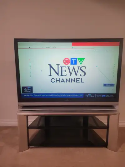 Sony LCD Television and Stand Works like New Comes with Sony Stand custom fit for this specific Tele...