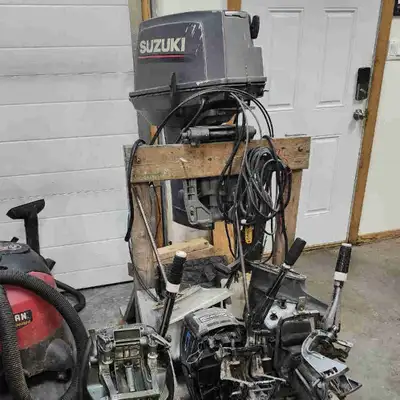 Boat motors for sale, good winter project. -40 HP Suzuki, Electric start and power trim. The leg has...