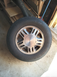 2 tires on chev minivan rims size:215-70-15 ($50.00)
