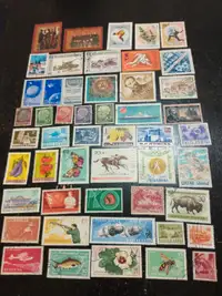 100 World stamps off paper LOT #6