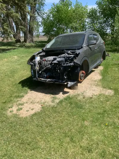 2014 Hyundai Santa Fe partings out, 2.4 l fwd, let me know what you need , delivery to Winnipeg poss...