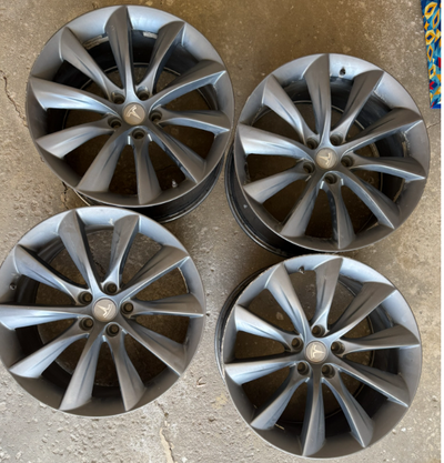 Upgrade your vehicle with this set of four Gloss GunMetal wheels, known for their sleek design and p...