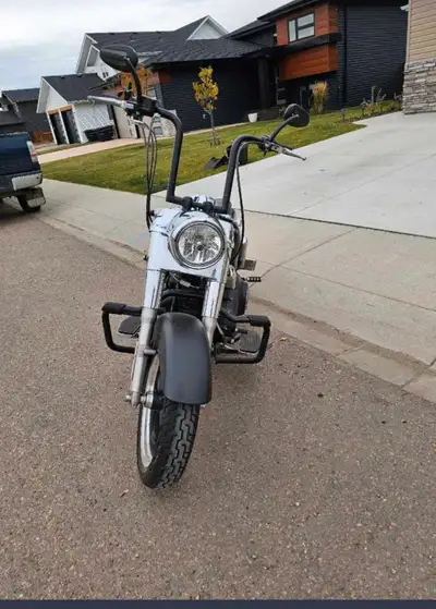 2012 Dyna FLD Switchback tuxedo black with a mat black finish, 14 inch bars Engine: 117 stage 3 air-...