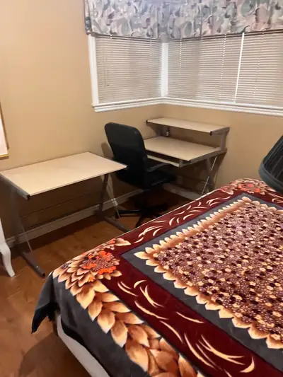 Main floor - One room of the house for rent. All inclusive; Furnished; clean house Close to St.Clair...