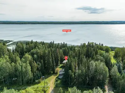 Waterfront lake lot has a cozy 1,200sq' cabin, double garage and bunk house. Main cabin has 3 bedroo...