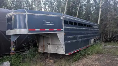Mustang horse trailer. Owned by one owner. Two interior divider doors, with 9'4" floor space, or 28'...