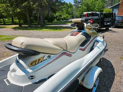 2001 Seadoo GTX rfi and shoreland'r trailer. Great shape. Comes with cover. Garage stored. New start...