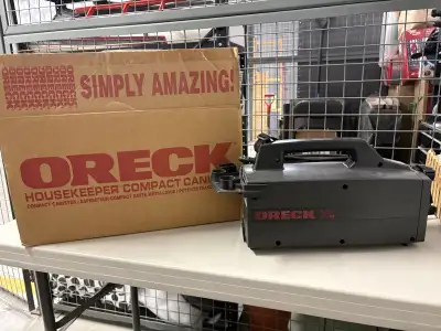 Oreck XL Handheld Canister Vacuum Cleaner Black w/ Attachments. New. Pick up only.