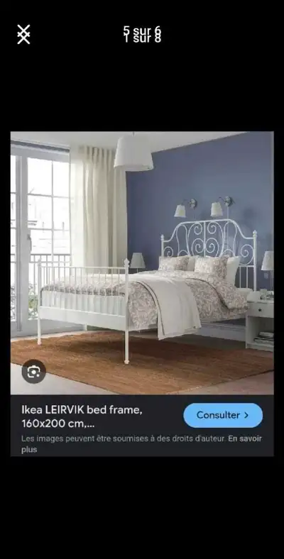 Usagé lit double. Pas de matelas. Seulement la base de lit. Blanc. Pas de sommier. Pas de livraison....