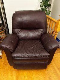 Leather rocker recliner armchair with extended full leg support