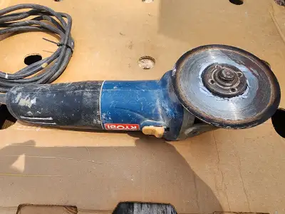 For sale a RYOBI 4 1/2- Inch Angle Grinder. Model # AG402. This was used to cut some small tiles, th...