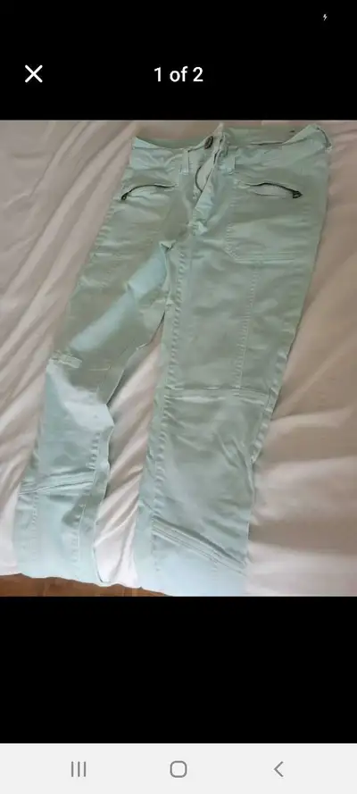 These are a pair of gently loved, light blue American Eagle pants in size 2. They're in good conditi...