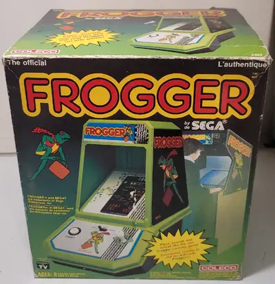 Vintage Frogger mini tabletop arcade machine from 1982 made by coleco and Sega. Tested and working a...