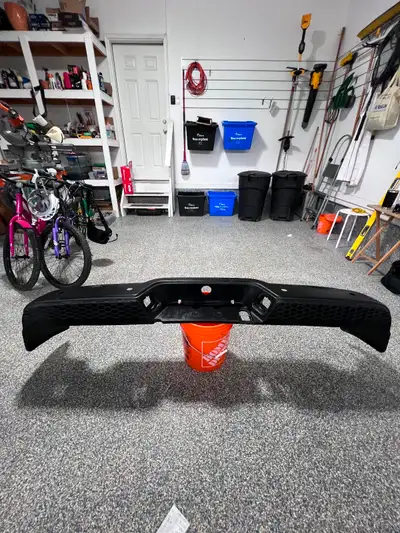 2022 Ram 1500 (warlock) black powder coated rear bumper. One small dent left of centre. No other dam...