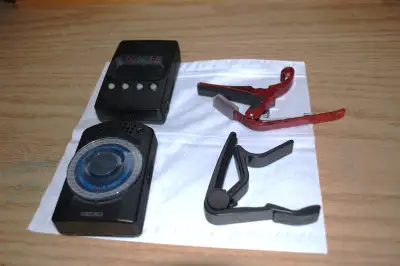 Guitar accessories, metronome, capos and tuner, View more