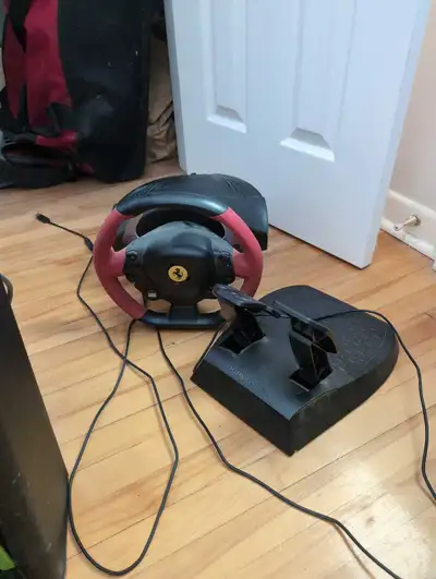 gaming steering wheel and pedals , View more