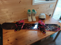 Women's snowboard, boots, bindings, and helmet