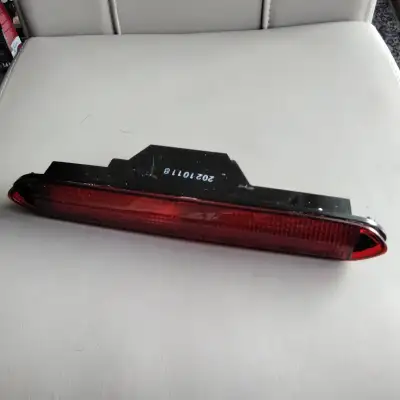 SELLING A REAR CENTER BREAK LIGHT COVER COMFTABLE WITH CERTAIN HONDA MODELS ONE OF THEM IS A HONDA P...