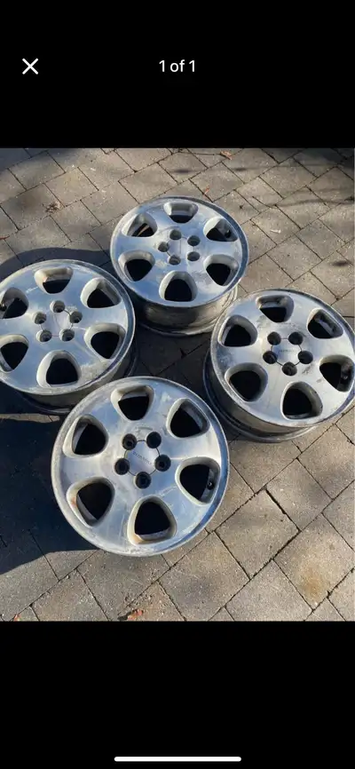 $100 for whole set Bolt pattern: 5x100 15”rim , 65 width tire Subaru original factory quality rims