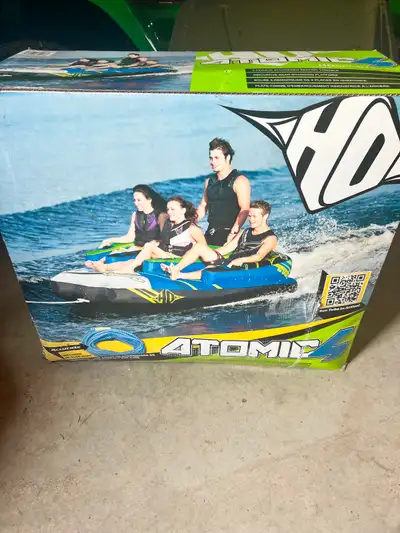 Brand NEW , never been out of the box. 4 person stackable towable , rear boarding platform , 4 K tub...