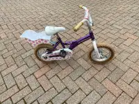 Purple young kids bike