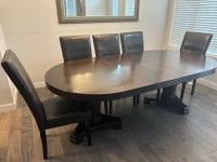 Expandable dining table with 8 chairs