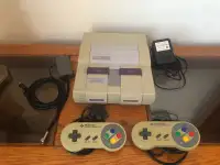 Super Nintendo + 2 controllers