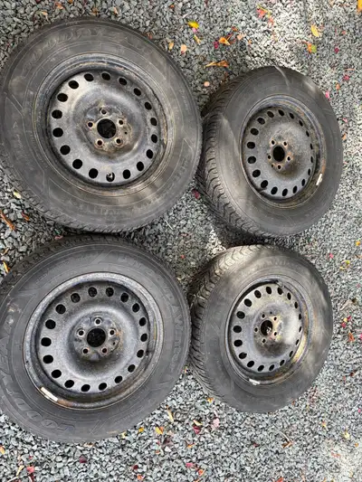 235 65 R17 Good condition tires with 5 bolt steel rims. Garage measured all at 4/32nds at end of las...