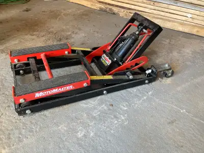 ATV jack. Holds the weight of the machine while in storage. Allows you to remove all 4 tires for mai...