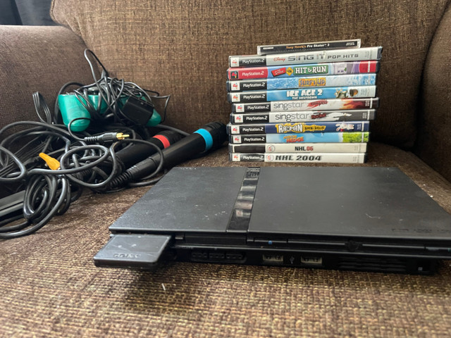 Playstation 2 Bundle with 2 controllers - 2 Microphones - Games in General Electronics in Peterborough