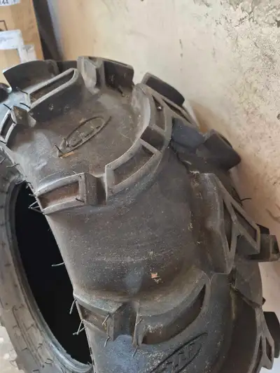 Brand new Mud Lite tire 27×9×12 $90. OBO