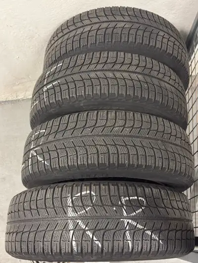 Used 15" Michelin X-Ice winter tires 195/65 R15. Comes with Rims used on Volkswagen Jetta (5 x 112 b...