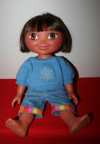 New Dora Doll,Bk's,and Clothes All For $6.00