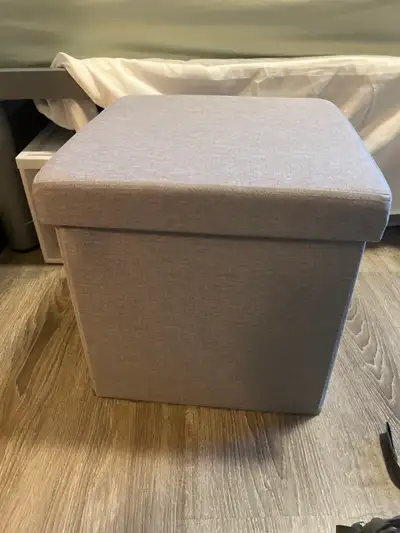 Small gray storage ottoman, View more