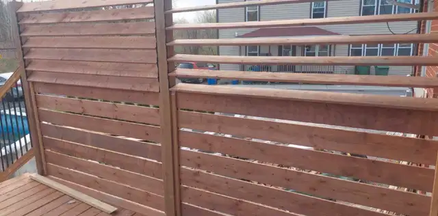 paved road,wall,lawn,fence,terrace,hut,hedge,field,temporary62863244212995124