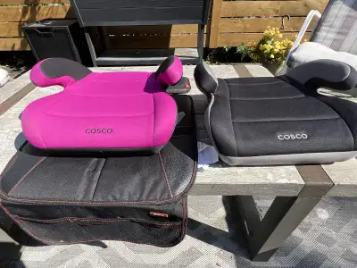 2 Cosco booster car seats with 1 seat protector, View more