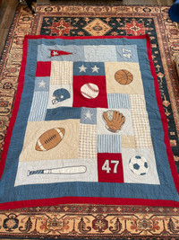 Twin sports quilt