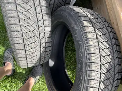 4 Almost new winter tires for sale 205/55/R17 used approx 5,000 km
