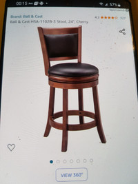 SWIVEL BAR STOOL. BALL AND CAST. BRAND NEW IN THE BOX. 24" SEAT