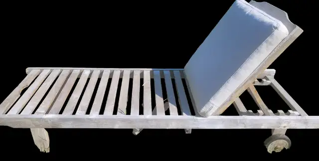 Wooden patio lounger w/ wheels. I deliver