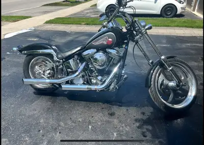 2009 Harley Davidson custom softail professionally, chopped and raked out front end. The bike stretc...
